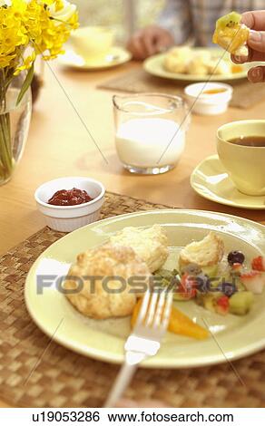 Stock Photograph - Scone and fruits. Fotosearch