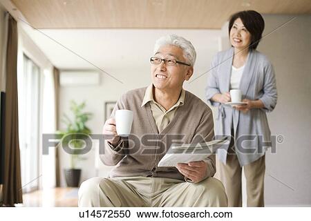 Senior couple drinking coffee View Large Photo Image Stock Image - Senior couple drinking coffee. Fotosearch