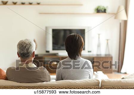 Senior couple watching TV View Large Photo Image Stock Image - Senior couple watching TV. Fotosearch