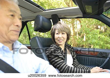 Senior man and mature woman in car View Large Photo Image Stock Photo - Senior man and mature woman in car. Fotosearch