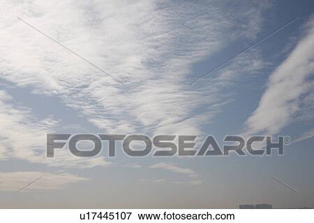 Stock Photo - Sky, cloud and building . Fotosearch