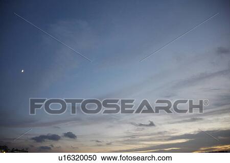 Stock Image - Sky, cloud and crescent moon. Fotosearch