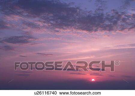 Stock Image - Sky in dusk, sunrise, Kagawa prefecture, Japan. Fotosearch