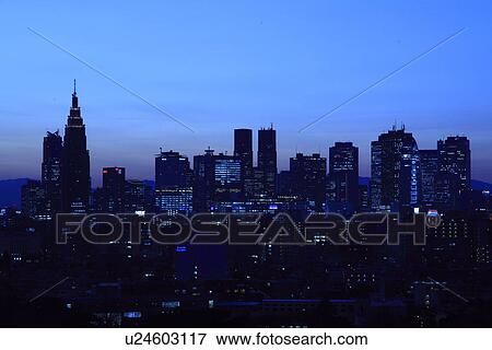 Stock Photo - Skyline of Shinjuku, Tokyo at dusk. Fotosearch