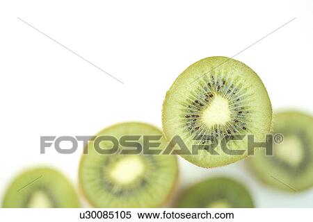 Stock Photography - Sliced Kiwi fruits. Fotosearch