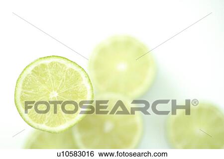 Sliced limes View Large Photo Image Stock Photograph - Sliced limes. Fotosearch