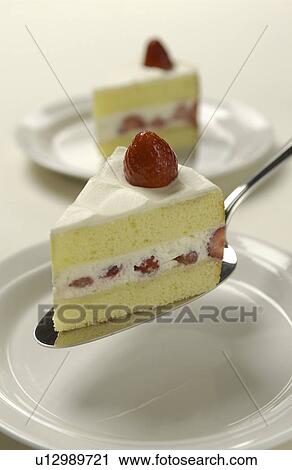 Sliced strawberry cake on server, white background View Large Photo Image Stock Image - Sliced strawberry cake on server, white background. Fotosearch