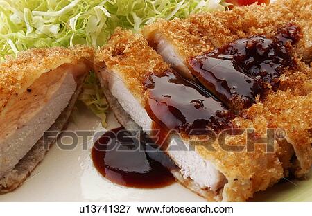 Slices of deep fried pork on plate, close up View Large Photo Image Stock Photo - Slices of deep fried pork on plate, close up. Fotosearch