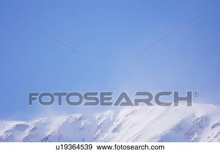 Stock Photo - Snowcapped mountain. Fotosearch
