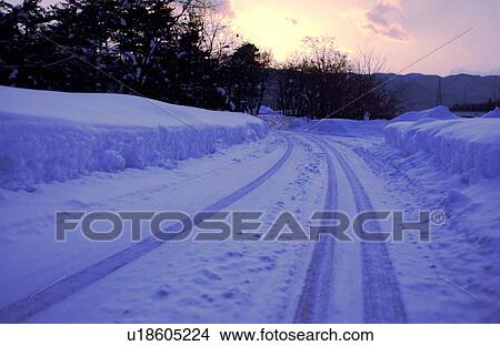 Snowy road View Large Photo Image Picture - Snowy road. Fotosearch