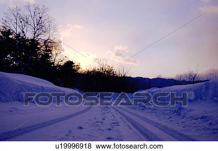 Snowy road View Large Photo Image Stock Photo - Snowy road. Fotosearch