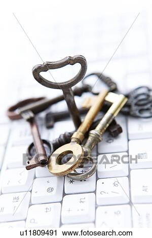 Stack of keys on computer keyboard, close up View Large Photo Image Stock Image - Stack of keys on computer keyboard, close up. Fotosearch
