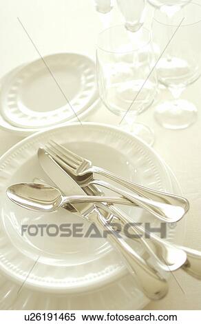 Still life of plates, wineglasses and silverware View Large Photo Image Stock Photography - Still life of plates, wineglasses and silverware. Fotosearch