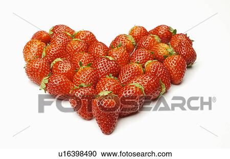 Strawberries arranged in heart shape, white background View Large Photo Image Stock Image - Strawberries arranged in heart shape, white background. Fotosearch