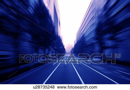 Street in city, blurred motion View Large Photo Image Stock Photo - Street in city, blurred motion. Fotosearch
