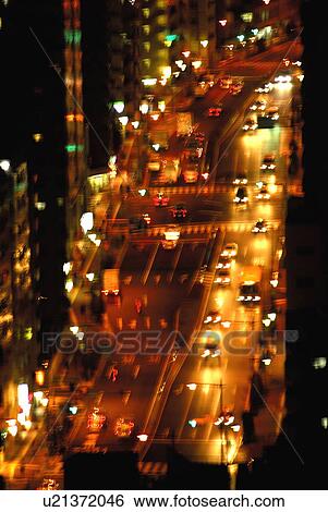 Stock Photograph - Street in the night, long exposure, Tokyo prefecture, Japan. Fotosearch