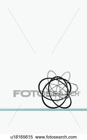 Tangled rings, white background, copy space View Large Photo Image Stock Photography - Tangled rings, white background, copy space. Fotosearch