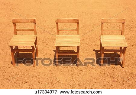 Three school chairs outdoors View Large Photo Image Stock Photo - Three school chairs outdoors. Fotosearch