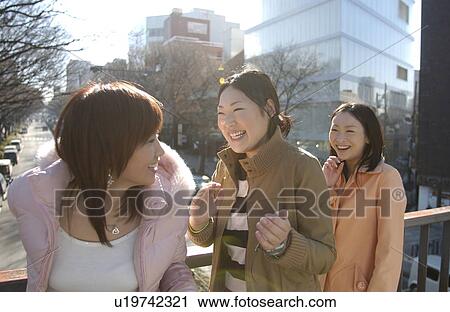 Three young women on footbridge, Tokyo Prefecture, Honshu, Japan View Large Photo Image Stock Image - Three young women on footbridge, Tokyo Prefecture, Honshu, Japan. Fotosearch