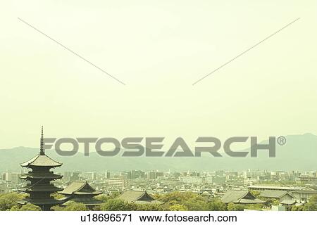 Stock Image - Toji Temple and townscape, copy space, Kyoto city, Kyoto prefecture, Japan. Fotosearch