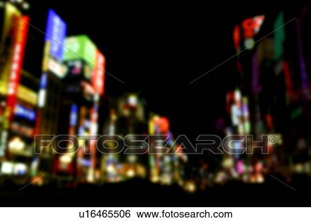 Stock Photograph - Tokyo cityscape in the night, long exposure, defocused, Tokyo prefecture, Japan. Fotosearch