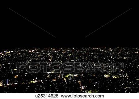 Stock Photograph - Tokyo cityscape in the night, long exposure, Tokyo prefecture, Japan. Fotosearch