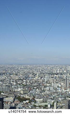 Picture - Tokyo cityscape under sky, copy space, Tokyo prefecture, Japan. Fotosearch