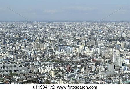 Stock Image - Tokyo cityscape under sky, Tokyo prefecture, Japan. Fotosearch