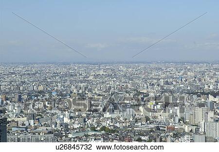 Tokyo cityscape under sky, Tokyo prefecture, Japan View Large Photo Image Stock Image - Tokyo cityscape under sky, Tokyo prefecture, Japan. Fotosearch