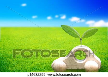 Stock Photo - Toy car with seedling on grass, computer graphic. Fotosearch