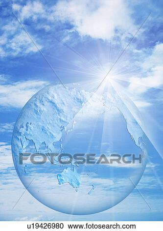 Stock Image - Transparent globe in sky, computer graphic. Fotosearch