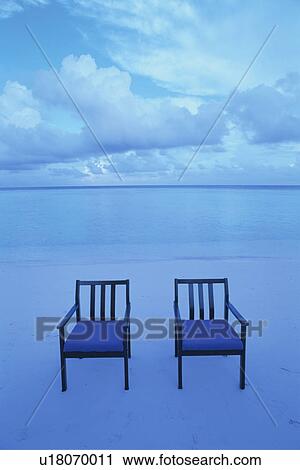 Stock Image - Two Armchairs on Beach. Fotosearch