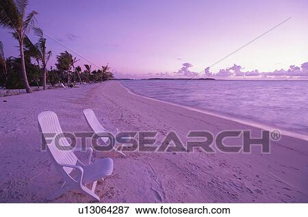 Stock Photo - Two Beach Chairs on Beach. Fotosearch