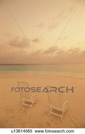 Stock Photography - Two Beach Chairs on Beach. Fotosearch