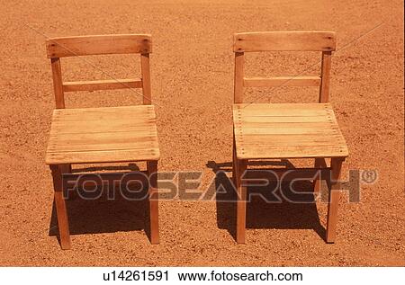 Stock Image - Two school chairs outdoors. Fotosearch