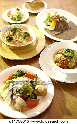 Stock Photography - Various dishes on table. Fotosearch