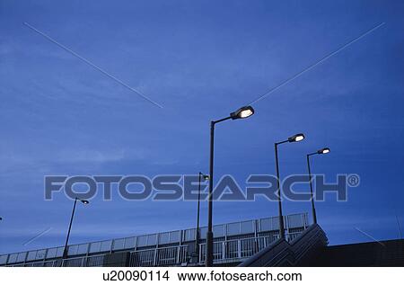 Picture - Walkway and streetlights at dusk, Tokyo Prefecture, Honshu, Japan. Fotosearch