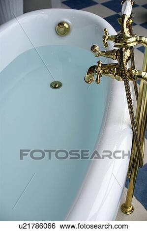 Stock Photograph - Water in bathtub. Fotosearch