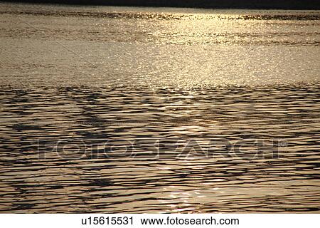 Water surface in the evening, sepia toned, full frame View Large Photo Image Stock Image - Water surface in the evening, sepia toned, full frame. Fotosearch