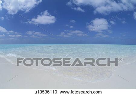 Stock Image - White Sand Beach and Horizon. Fotosearch