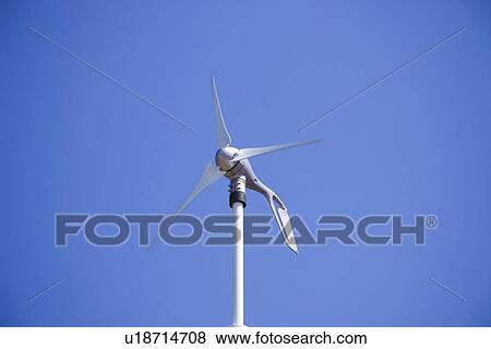 Wind turbine under sky, blue background, Higashiomi city, Shiga prefecture, Japan View Large Photo Image Stock Photo - Wind turbine under sky, blue background, Higashiomi city, Shiga prefecture, Japan. Fotosearch