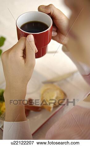 Stock Photo - Woman drinking coffee. Fotosearch