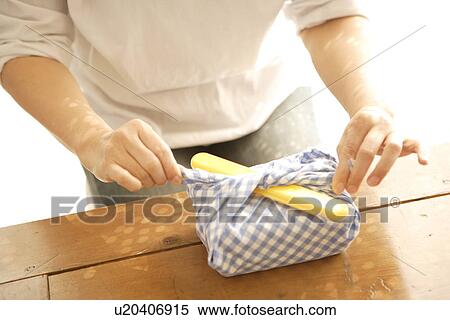 Woman wrapping lunchbox View Large Photo Image Stock Photography - Woman wrapping lunchbox. Fotosearch