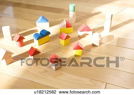 Stock Image - Wooden houses on floor. Fotosearch