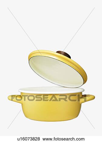 Yellow pot with open lid View Large Photo Image Stock Photo - Yellow pot with open lid. Fotosearch