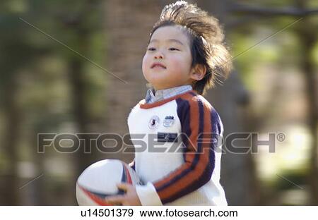 Young boy running, blurred motion, Tokyo Prefecture, Honshu, Japan View Large Photo Image Stock Photo - Young boy running, blurred motion, Tokyo Prefecture, Honshu, Japan. Fotosearch