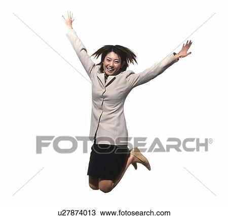 Young businesswoman jumping View Large Photo Image Stock Image - Young businesswoman jumping. Fotosearch