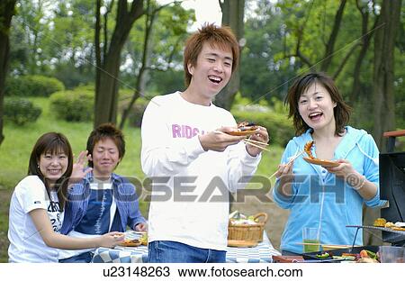 Young people enjoying barbecue, Tokyo Prefecture, Honshu, Japan View Large Photo Image Stock Image - Young people enjoying barbecue, Tokyo Prefecture, Honshu, Japan. Fotosearch