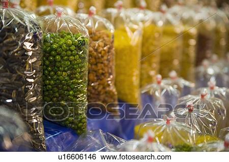 a display of dried goods at a market View Large Photo Image Stock Photograph - a display of dried goods at a market. Fotosearch