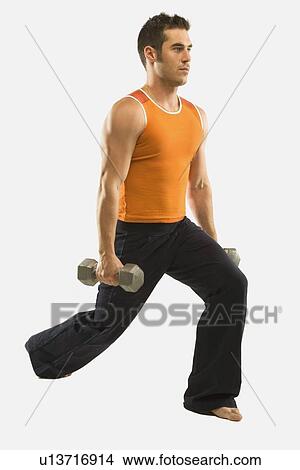 Picture - a man exercising with free weights. Fotosearch
